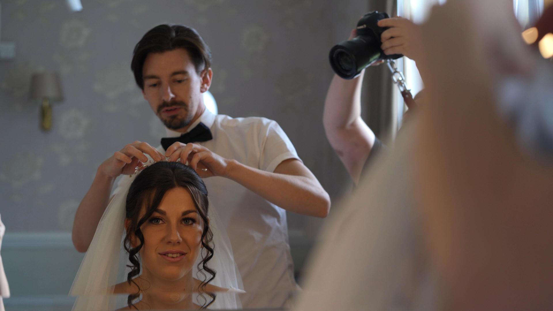 duncan fisher finishing bridal look with veil