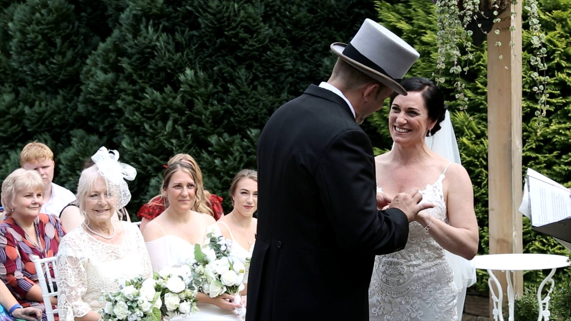 bride and groom laugh during outdoor wedding at Whitley Hall