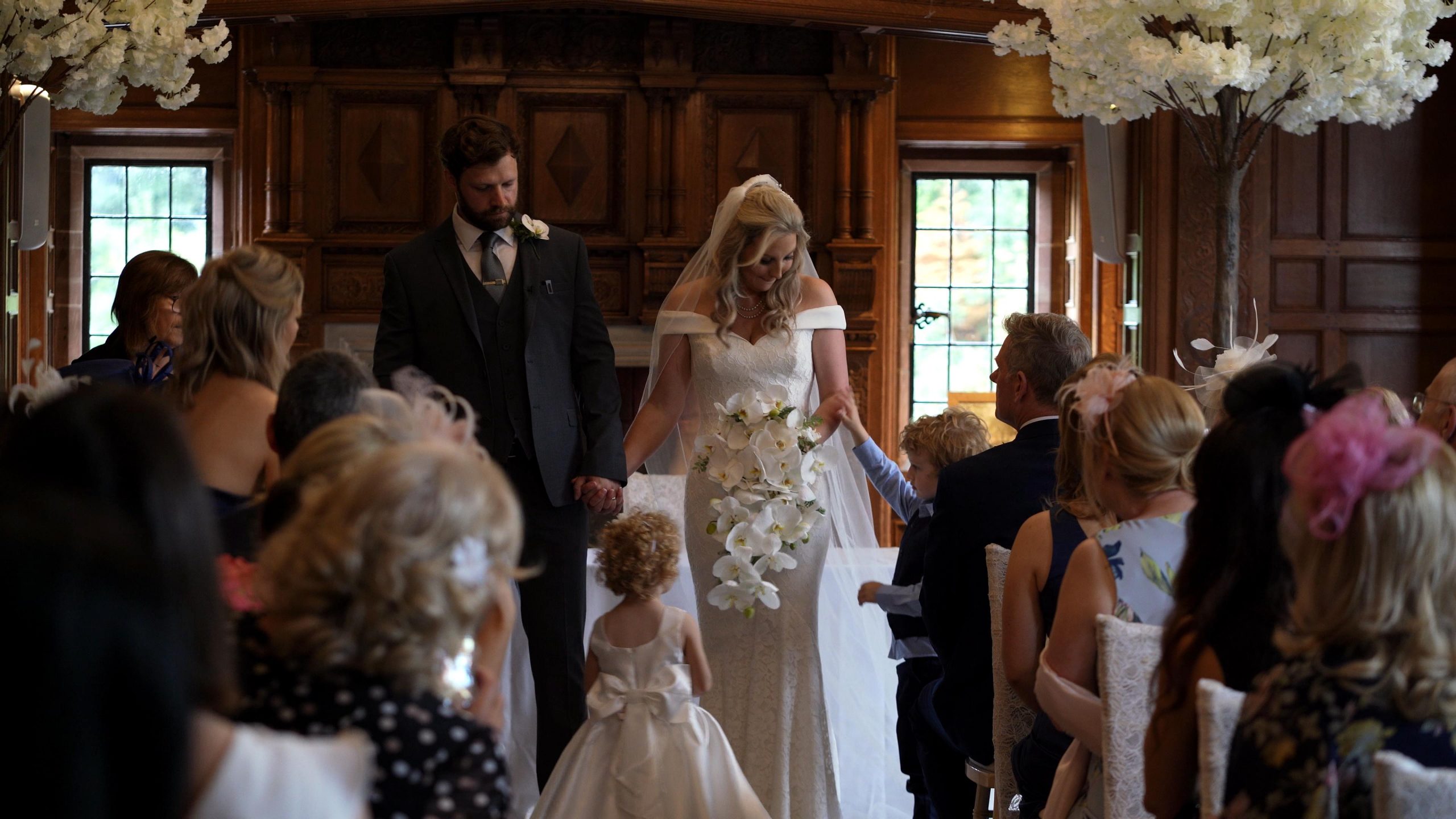bride and groom with children at their wedding ceremony