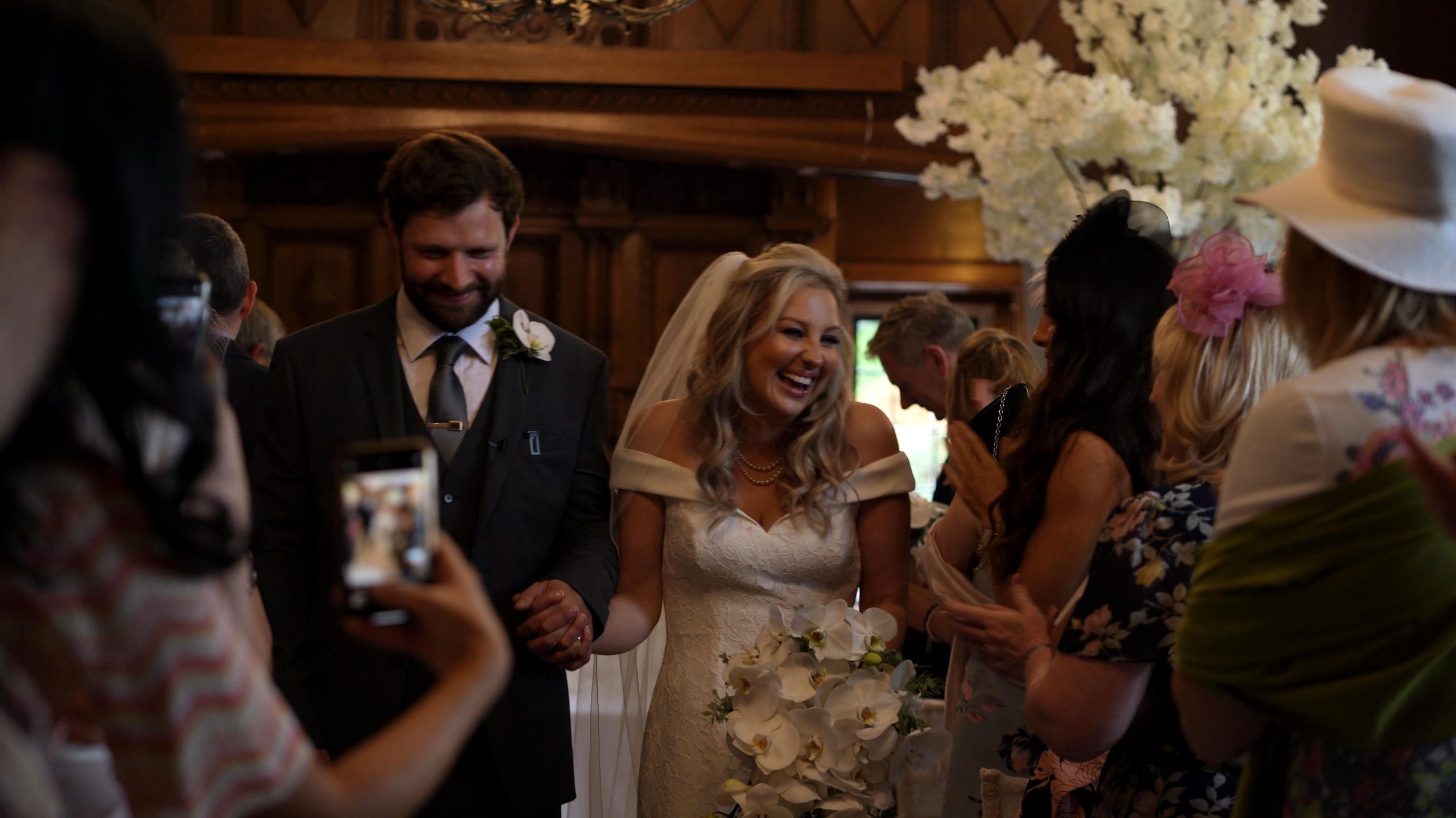couple walk down aisle at Inglewood manor