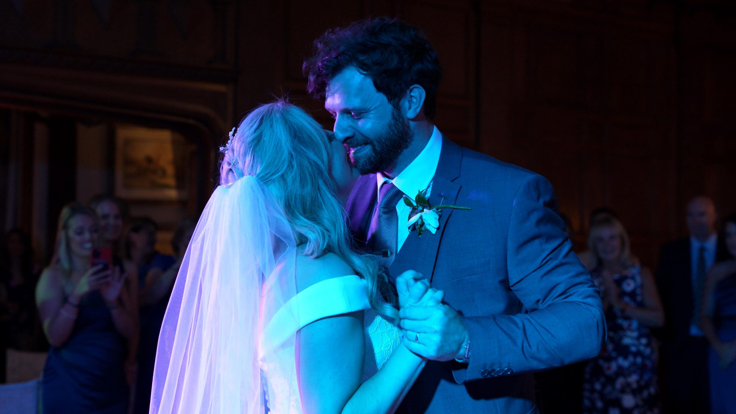 couple smile at each other during first dance