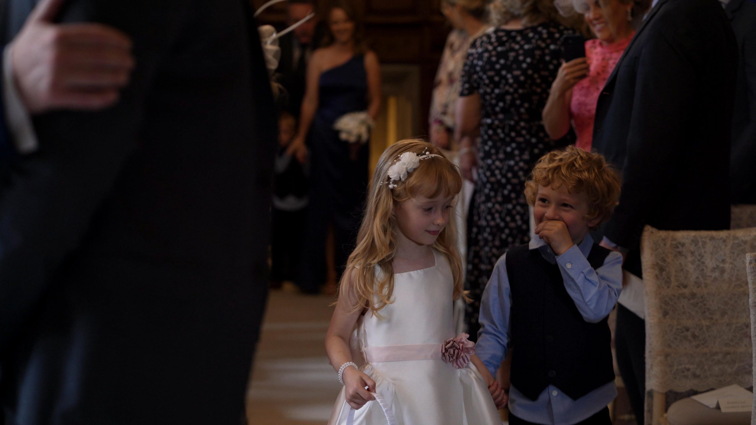 children walk down the aisle at inglewood manor wedding