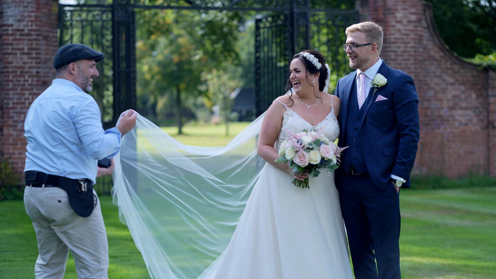 couple laugh with wedding photographer Ioan Said