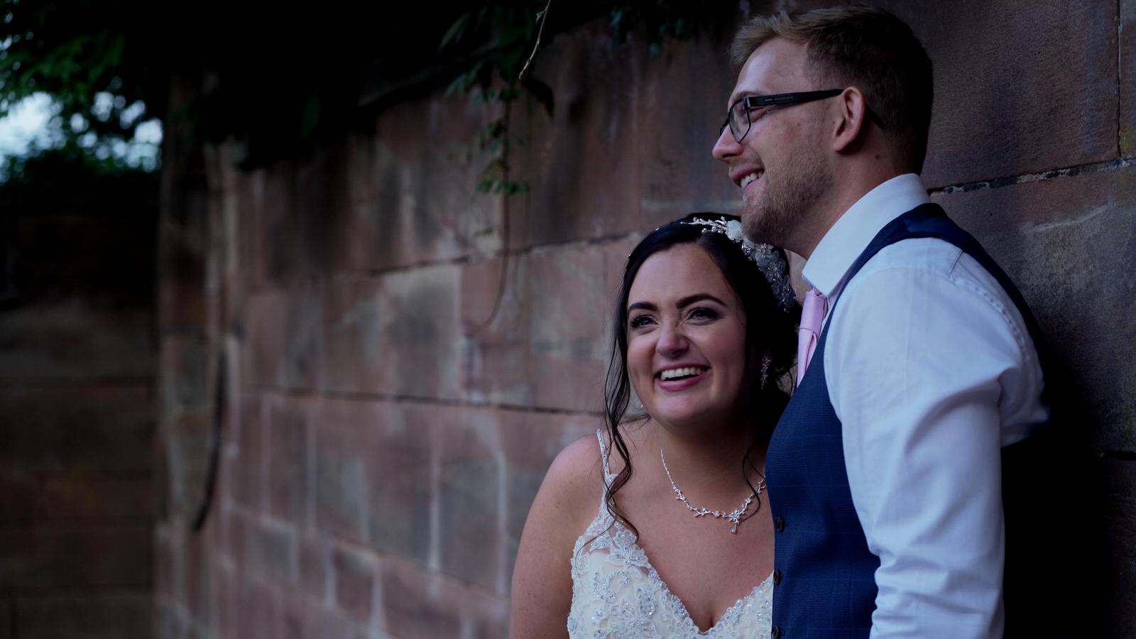 couple look relaxed in Inglewood manor gardens