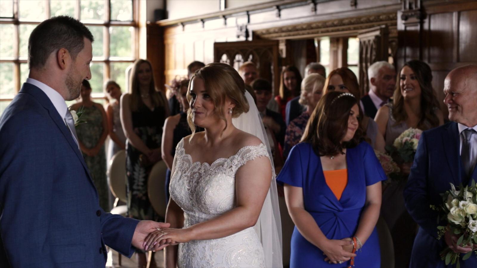 video still of couple exchanging wedding rings at hillbark hotel
