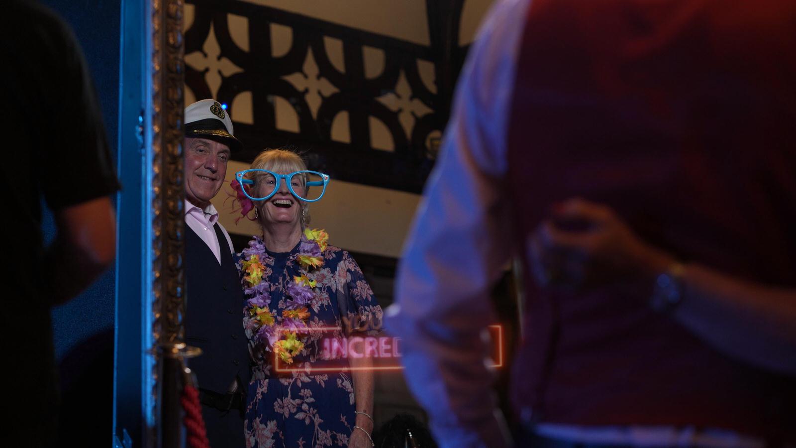 guests enjoying selfie mirror photobooth in Wirral