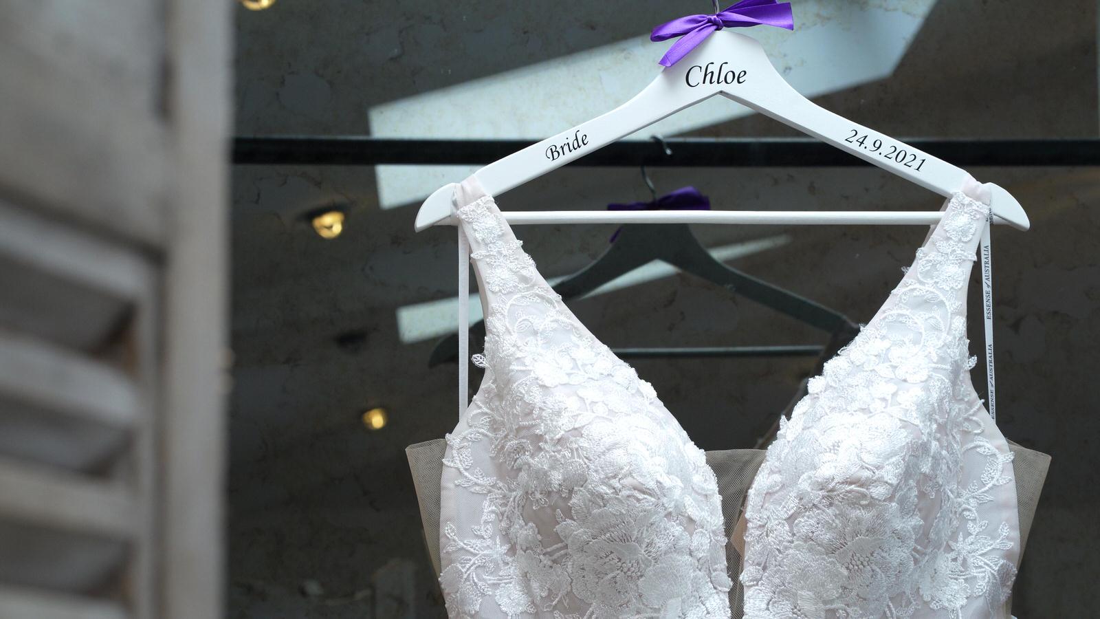 wedding dress hangs up in bridal suite at owen house