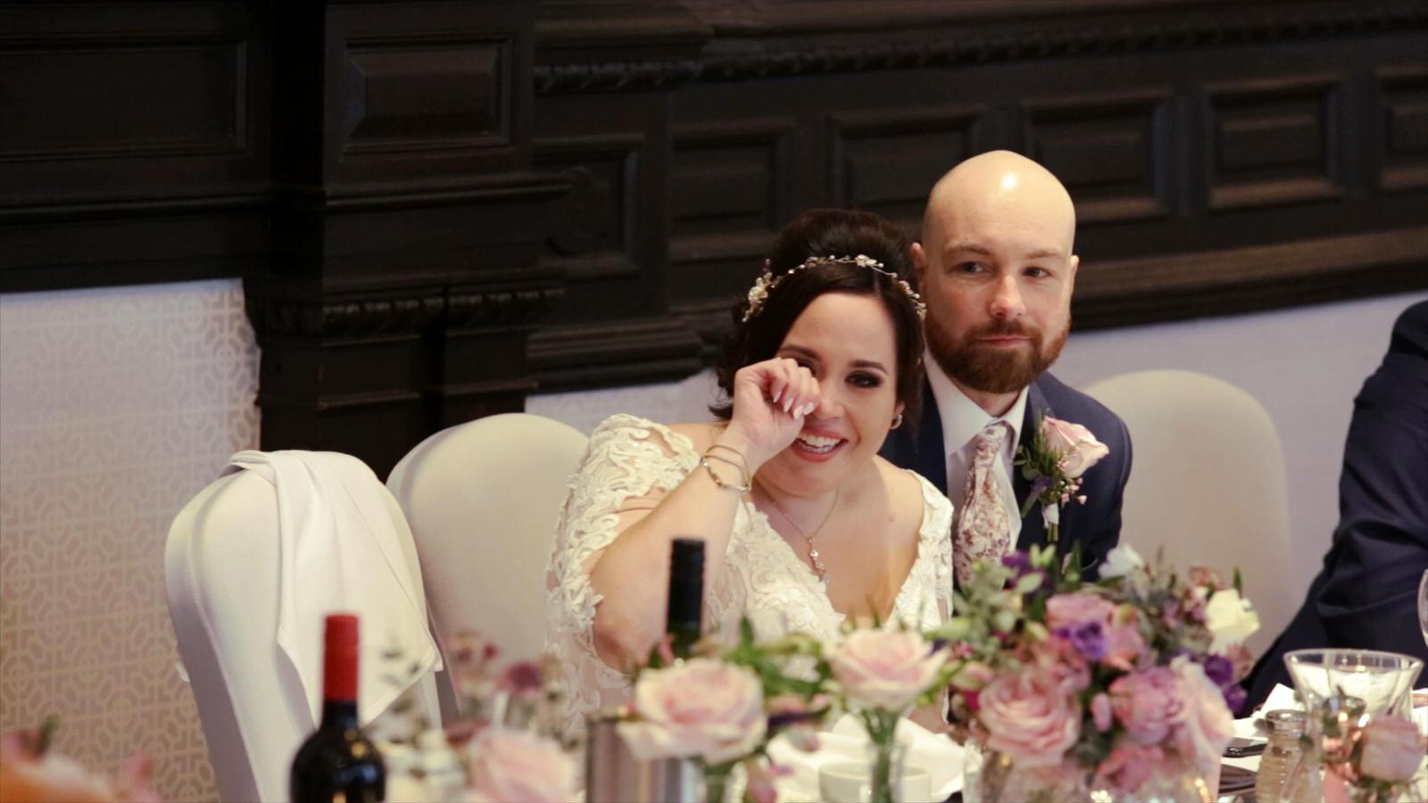bride wipes away tears during mums speech