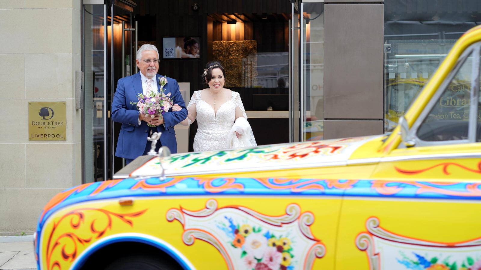 bride and dad waiting for john lennon rolls