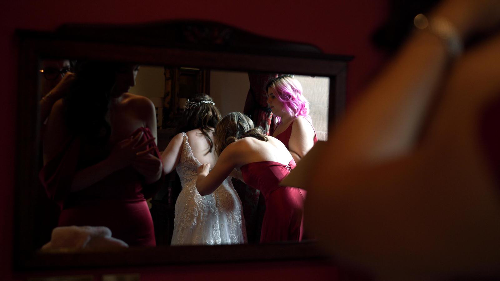 creative candid video of bride getting dressed