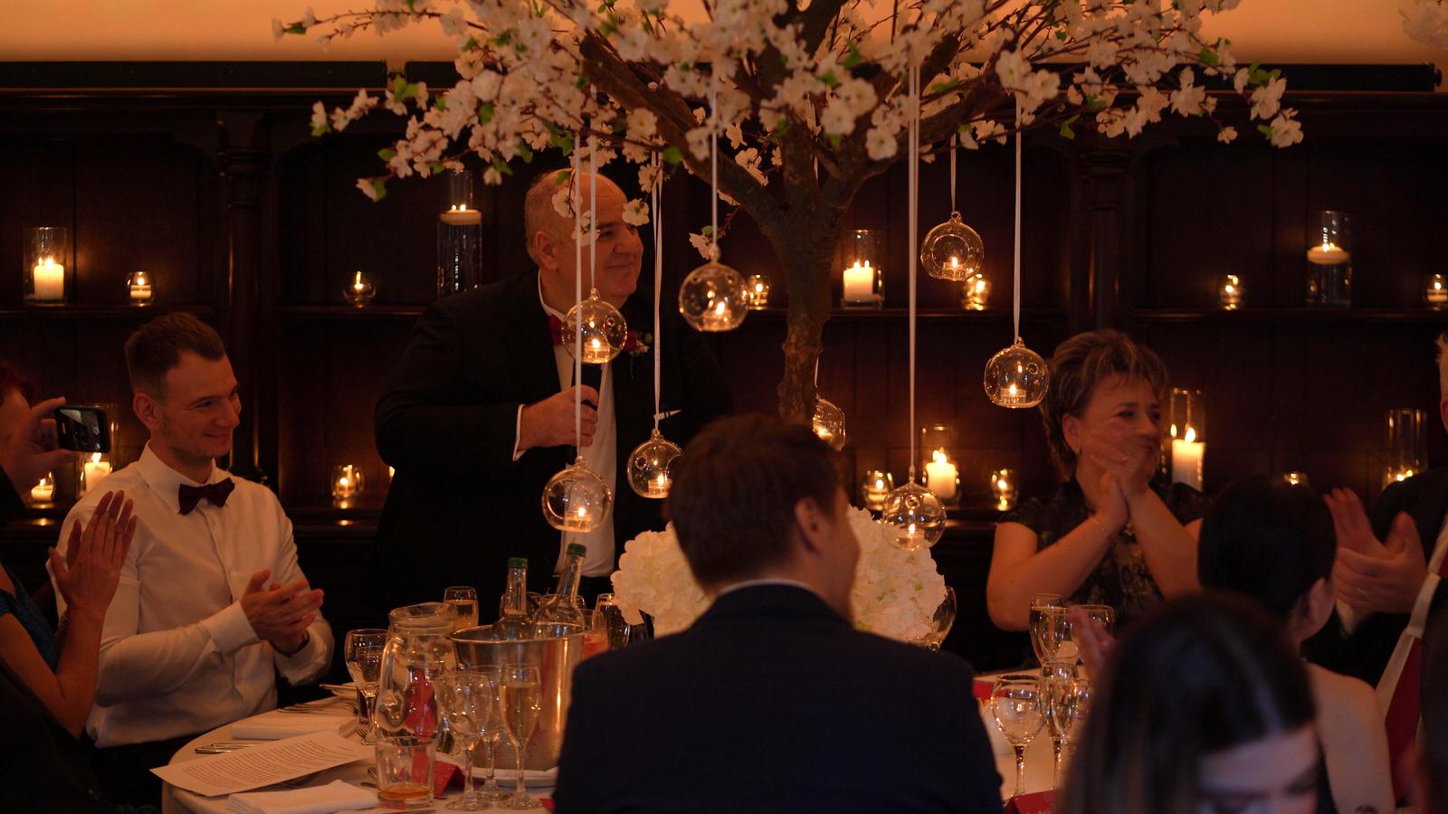 candlelit wedding speeches at peckforton castle