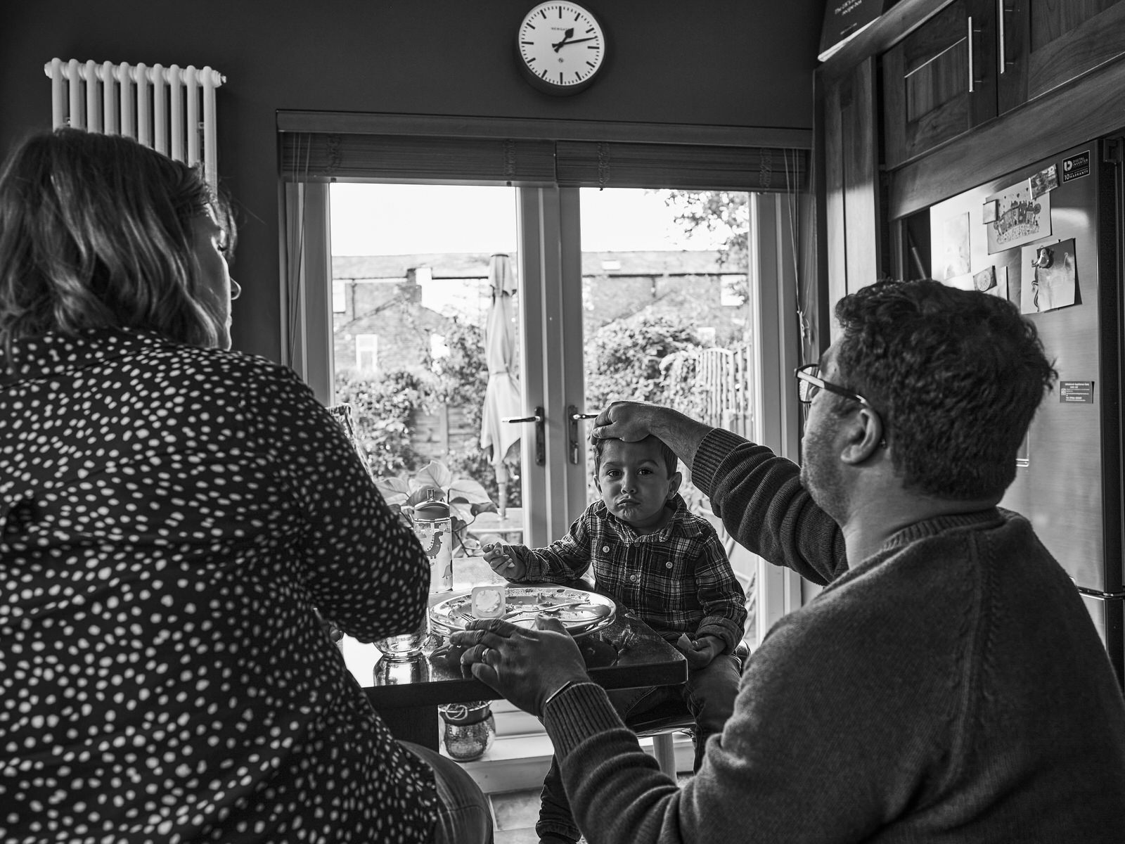 documentary photo of family having lunch in manchester