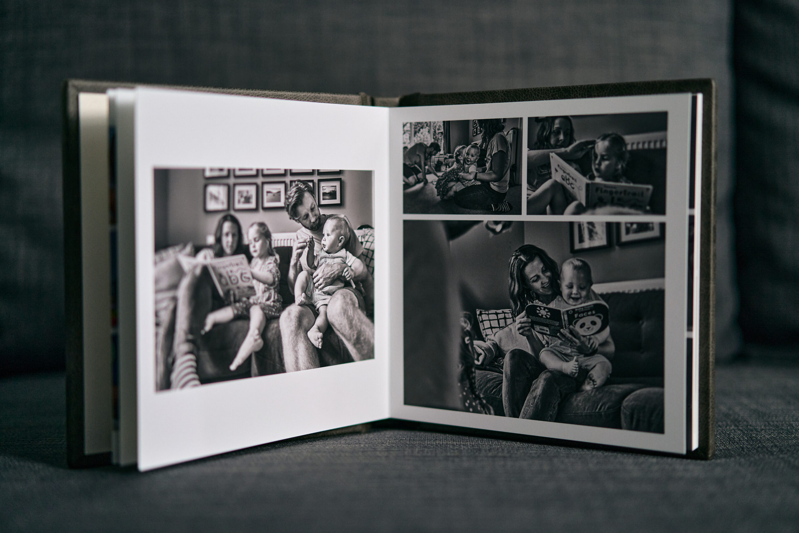 family photo album open on sofa