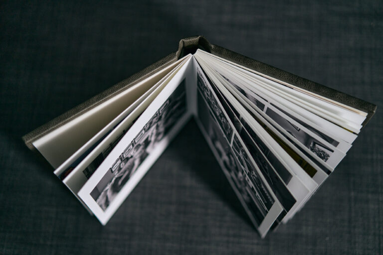 shot of family photo album thick pages from above