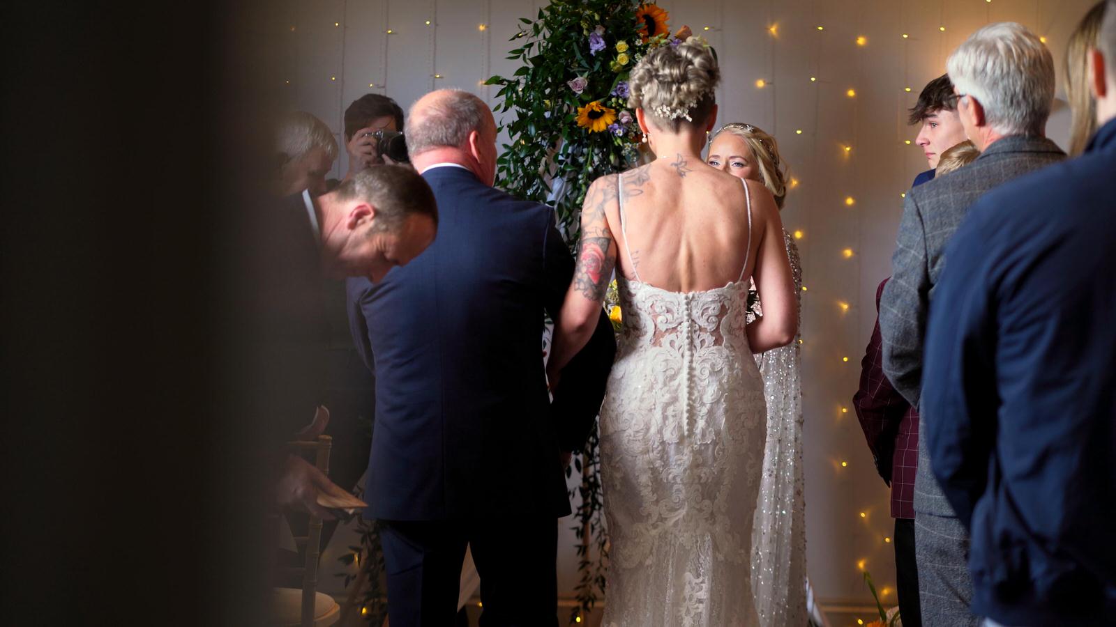 two brides meet at the aisle during Chilli Barn Ceremony