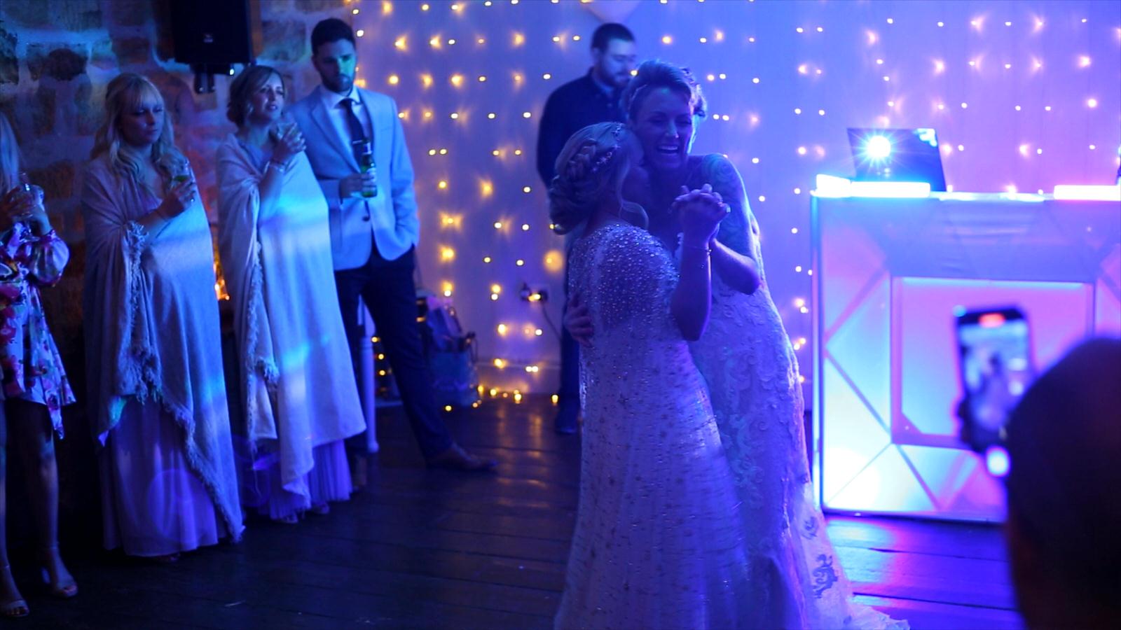 same sex couples first dance at Chilli Barn