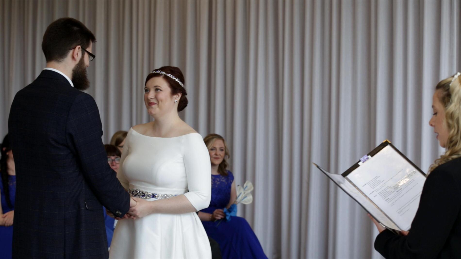 couple say vows during wedding ceremony at Rookery Hall