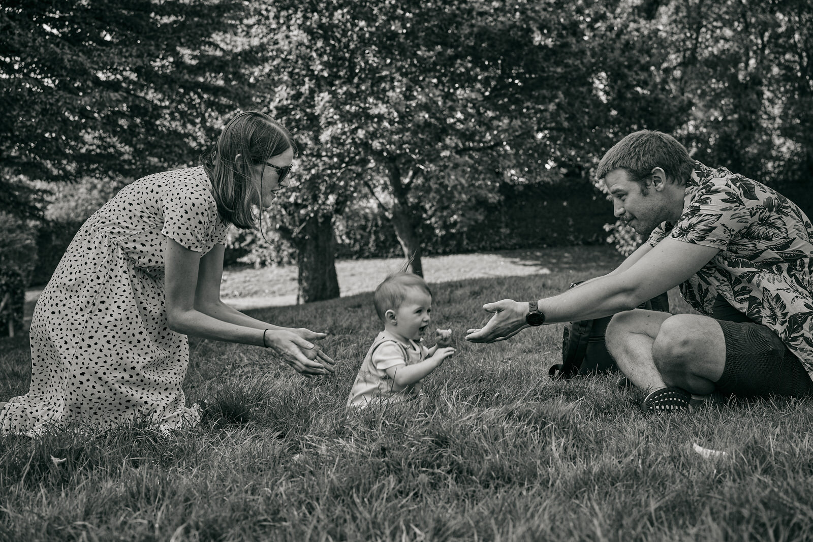 natural outdoor photo of family in the park