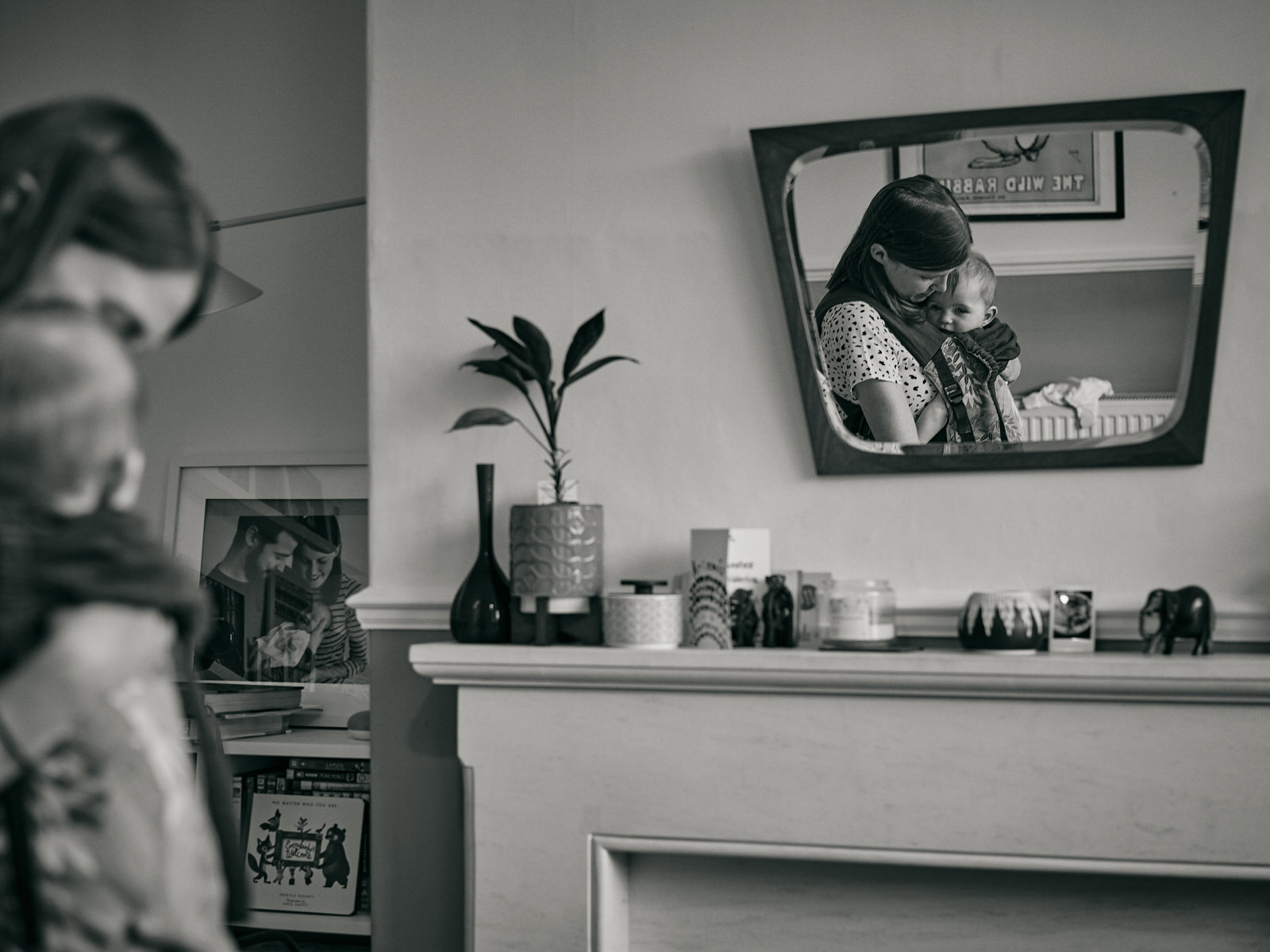 reflection of mum and baby in a mirror