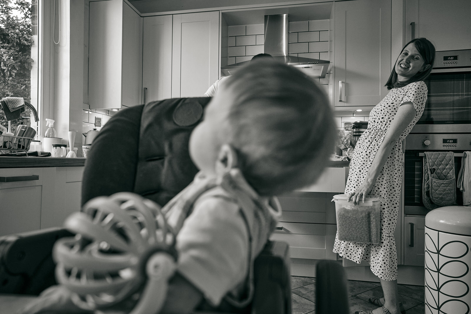 baby mirrors mums lean in their high chair