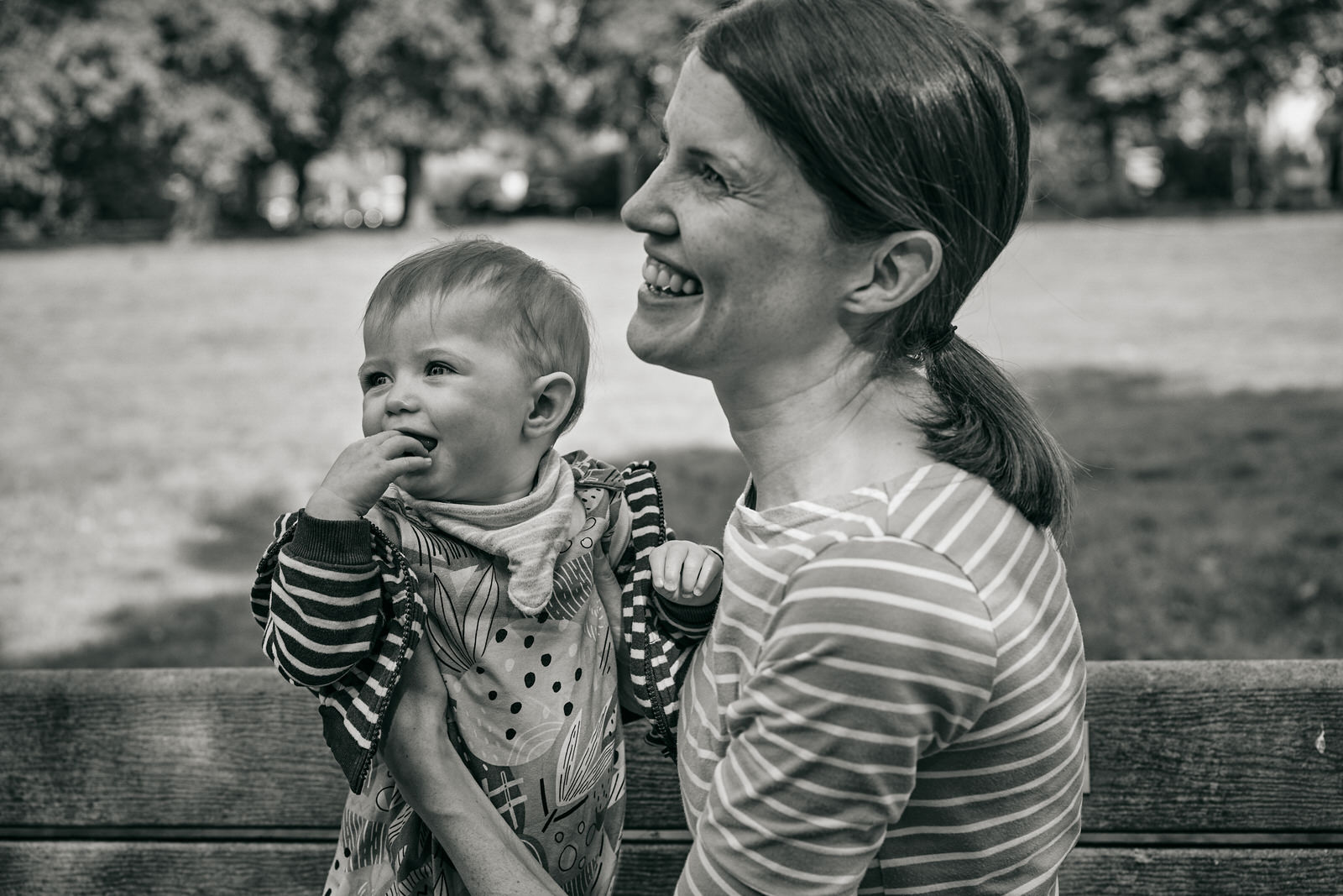 mum and daughter smile during photoshoot