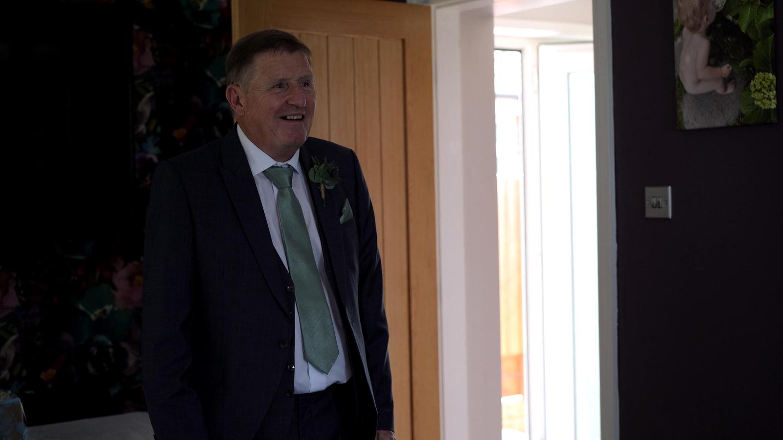 video still of a dads reaction to the bride