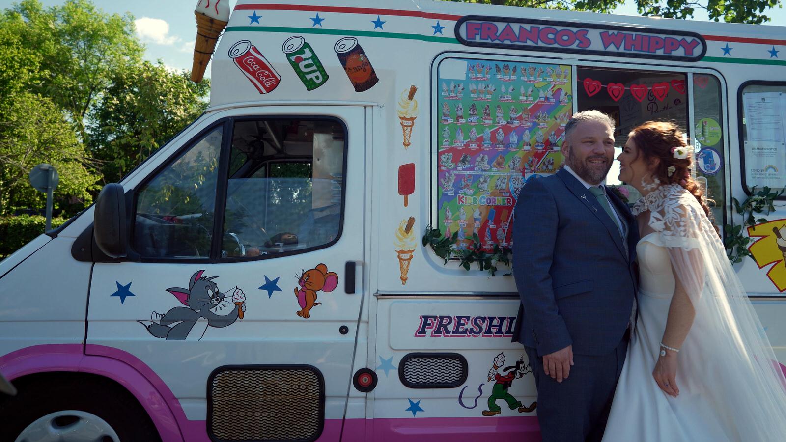 a couple pose by their ice cream van outside Mawdesley