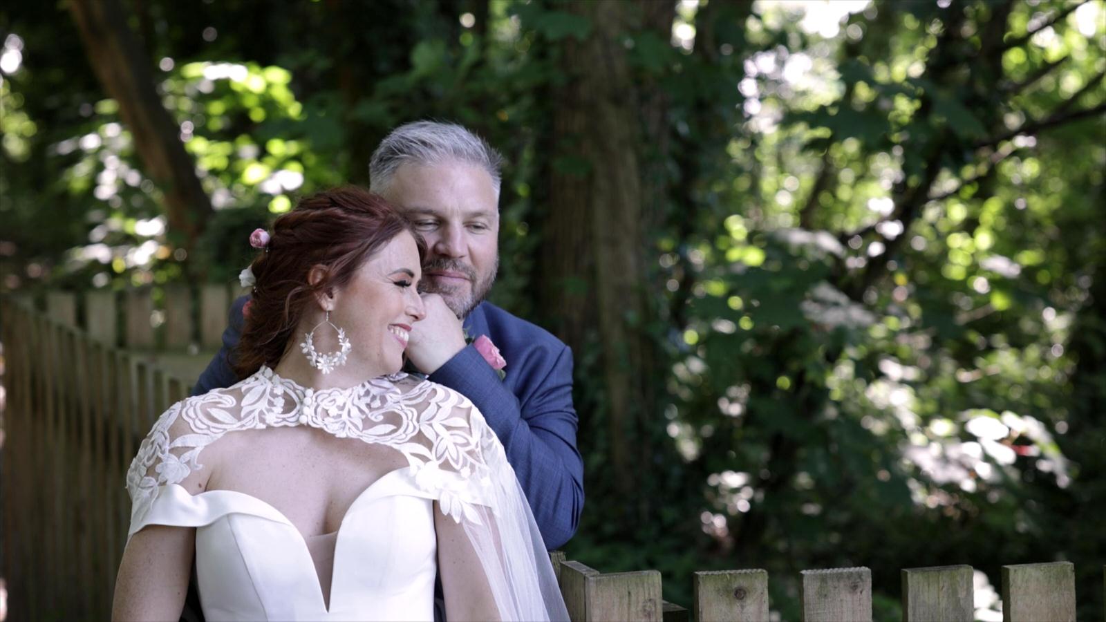 a couple pose in Mawdesley green