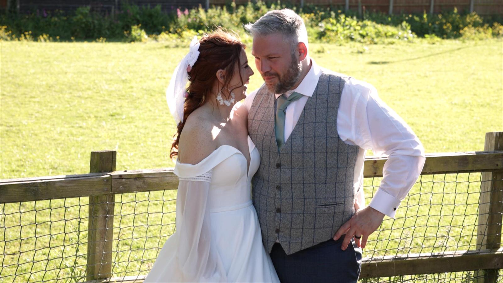 the couple pose in the golden hour in Mawdesley