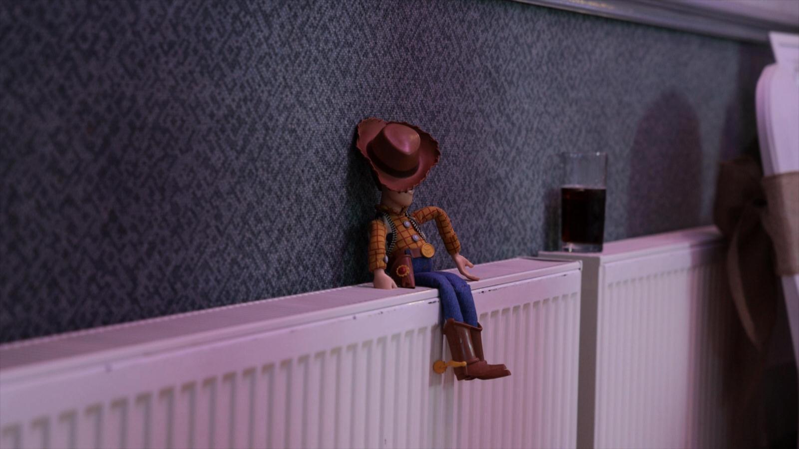 a woody doll looks drunk at wedding