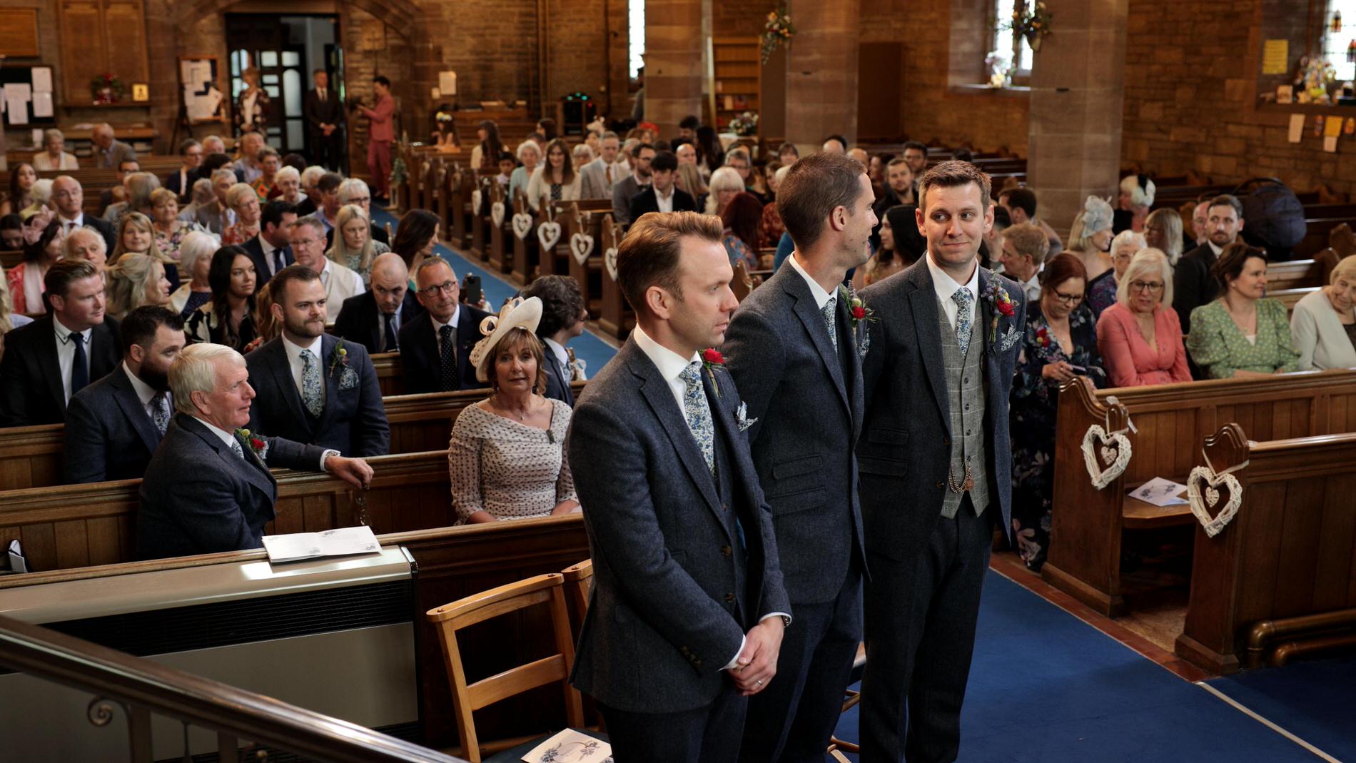 groom waits nervously in church