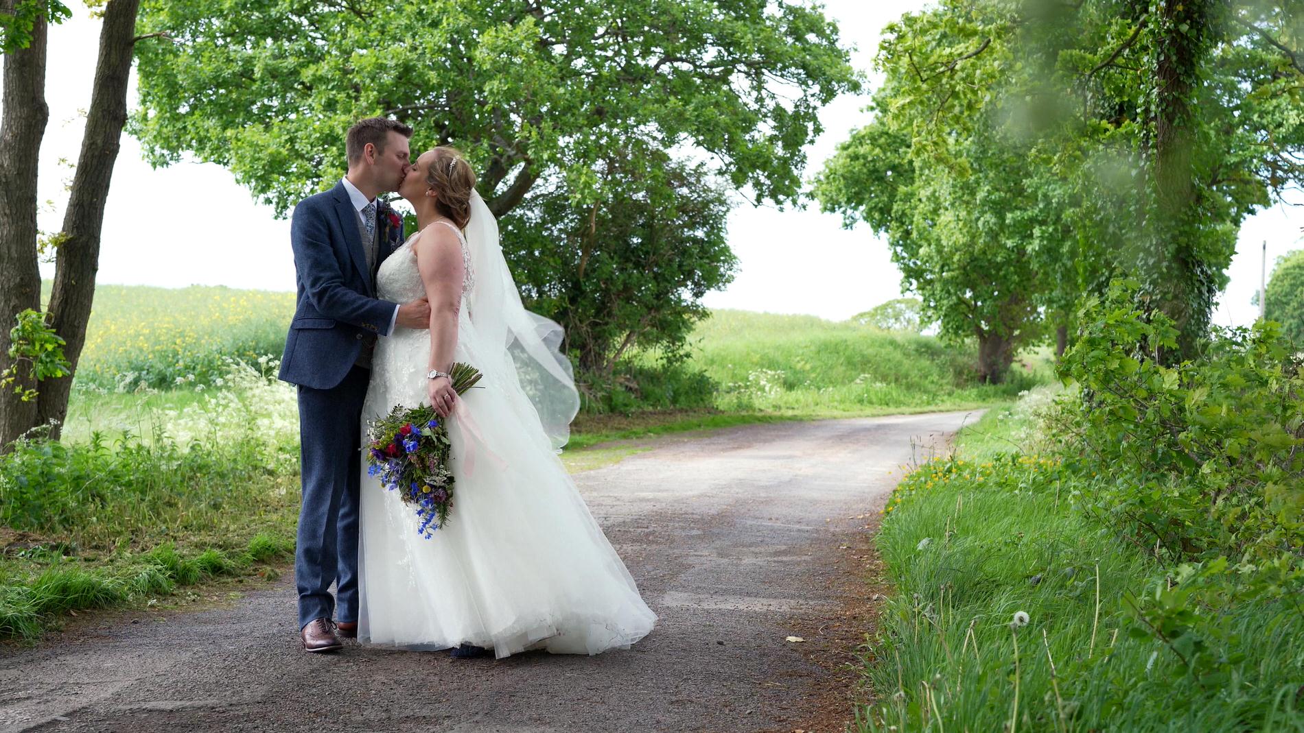 video still of couple kissing for couples portraits