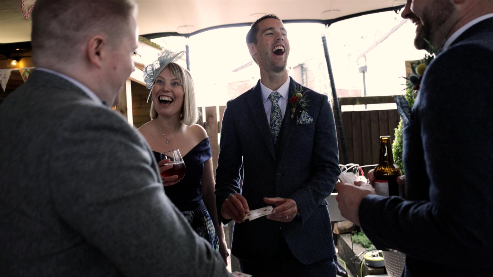 Mason king entertaining guests during reception