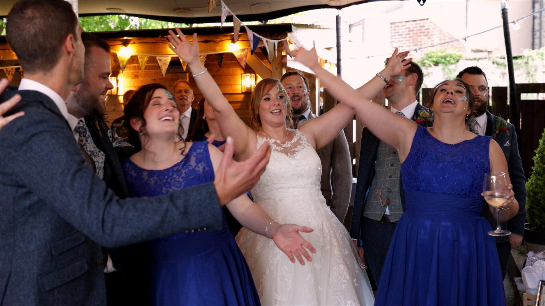 bridal party dance along to Mark Frith at wedding