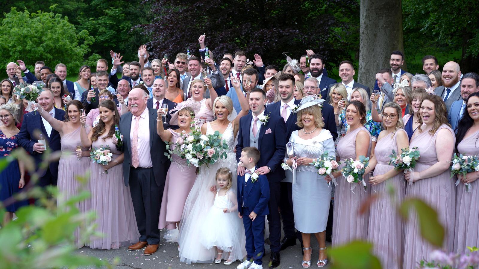 wedding group shot in Rivington hall barn gardens