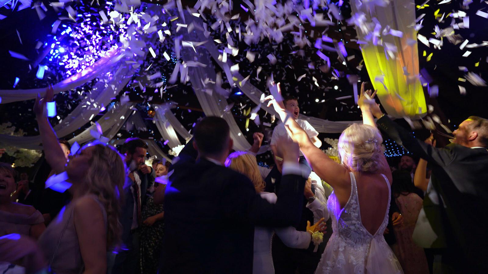 video still of confetti canon surprise during first dance