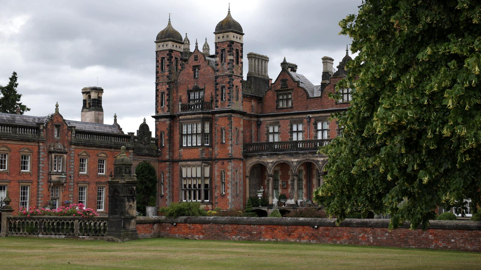 front of capesthorne hall wedding venue in cheshire