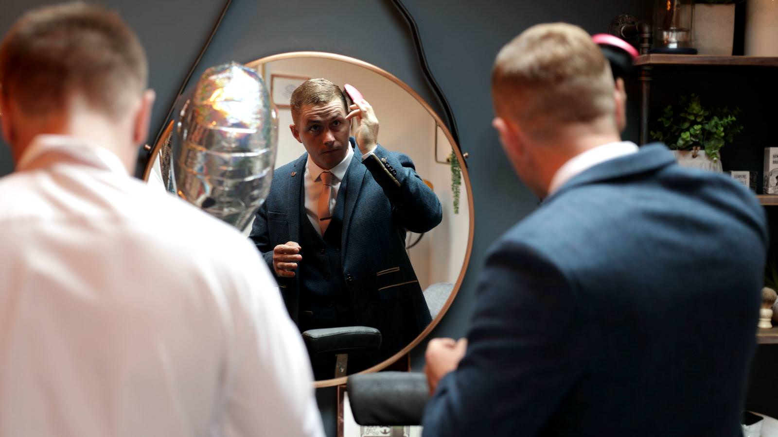 groom getting ready at Merrydale Manor