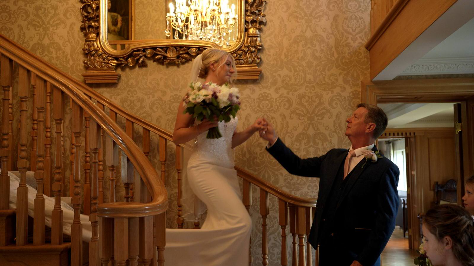 a bride and dad cry during first look at Merrydale