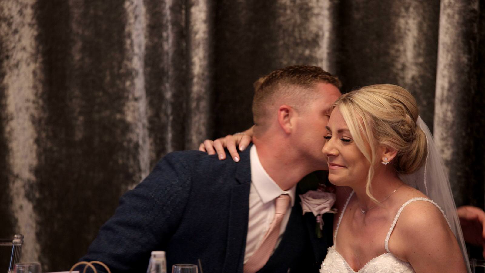 emotional hug during wedding speeches