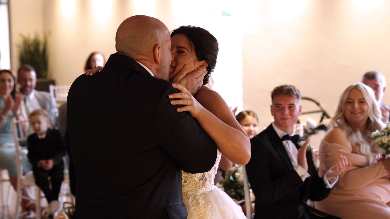 couple enjoy a proper kiss during wedding at The Castlefield Rooms Manchester