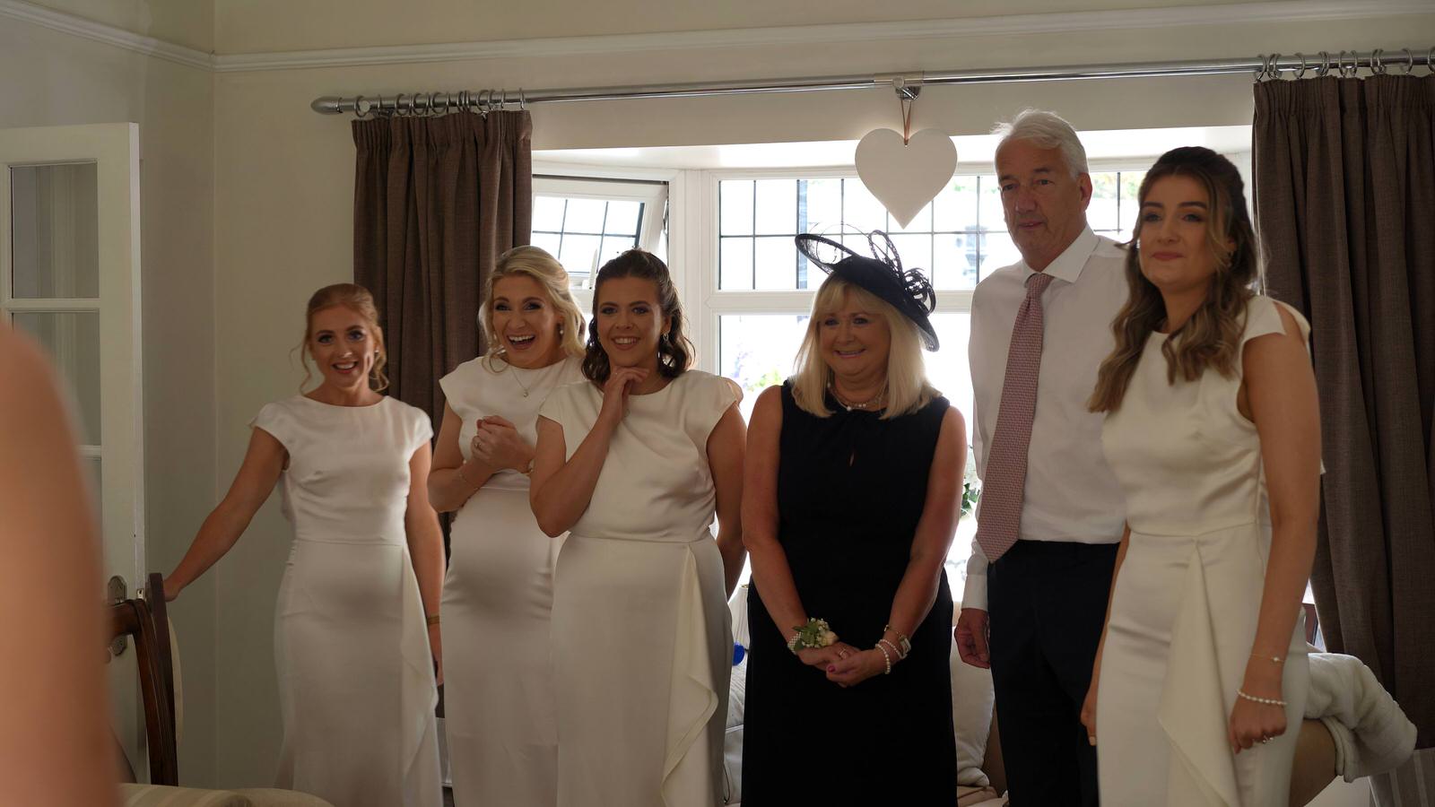 bridesmaids reaction to the brides dress