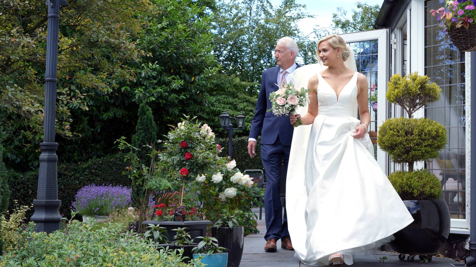 bride leaves parents house in the wirral