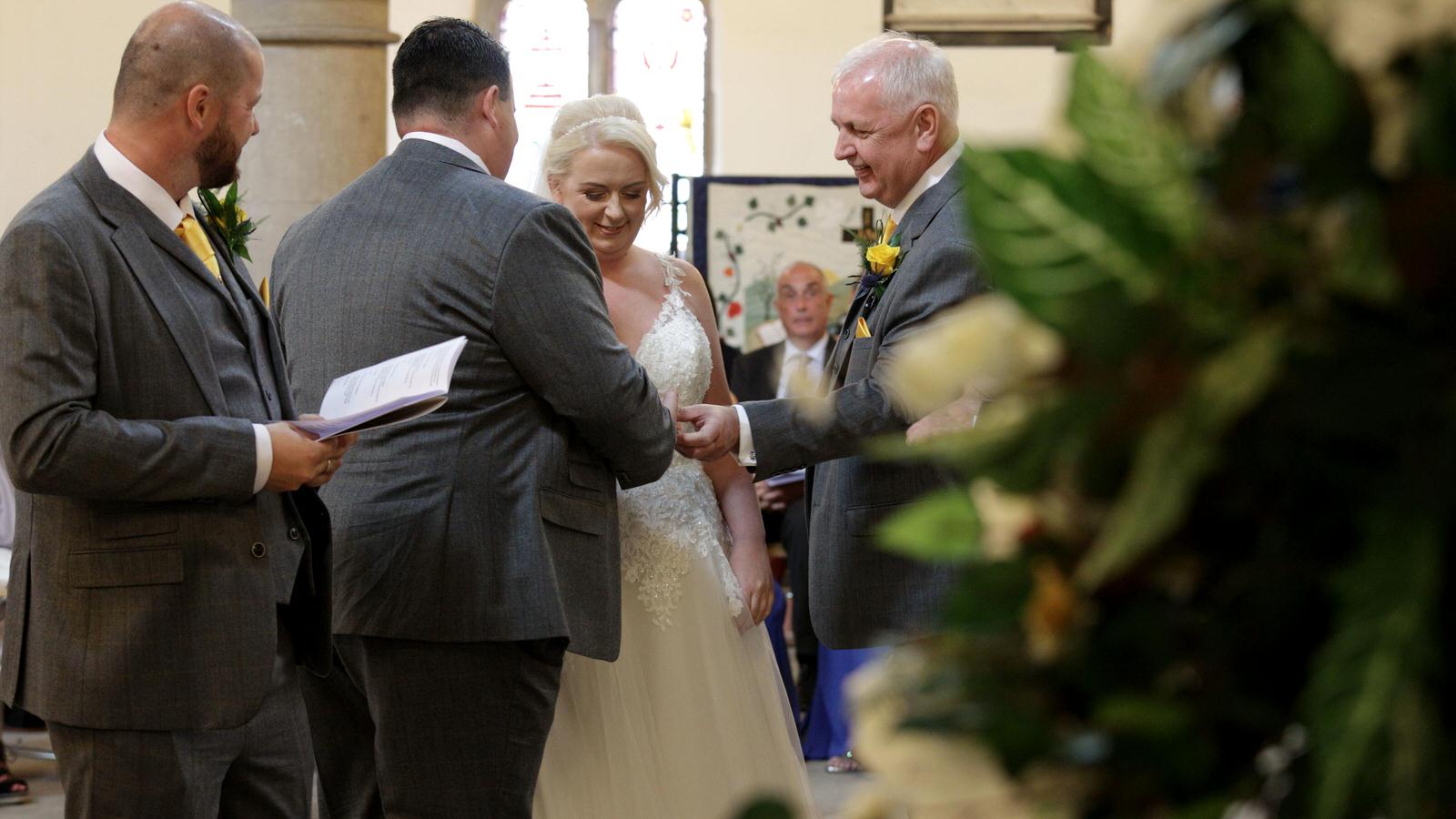 dad hands over daughter during ceremony