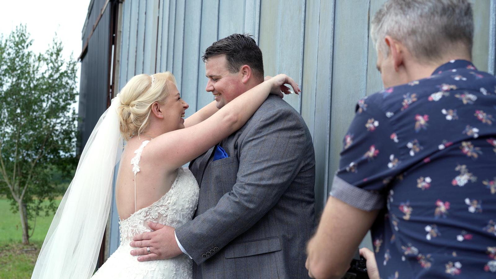phil salisbury photographing wedding couple at Beeston Manor
