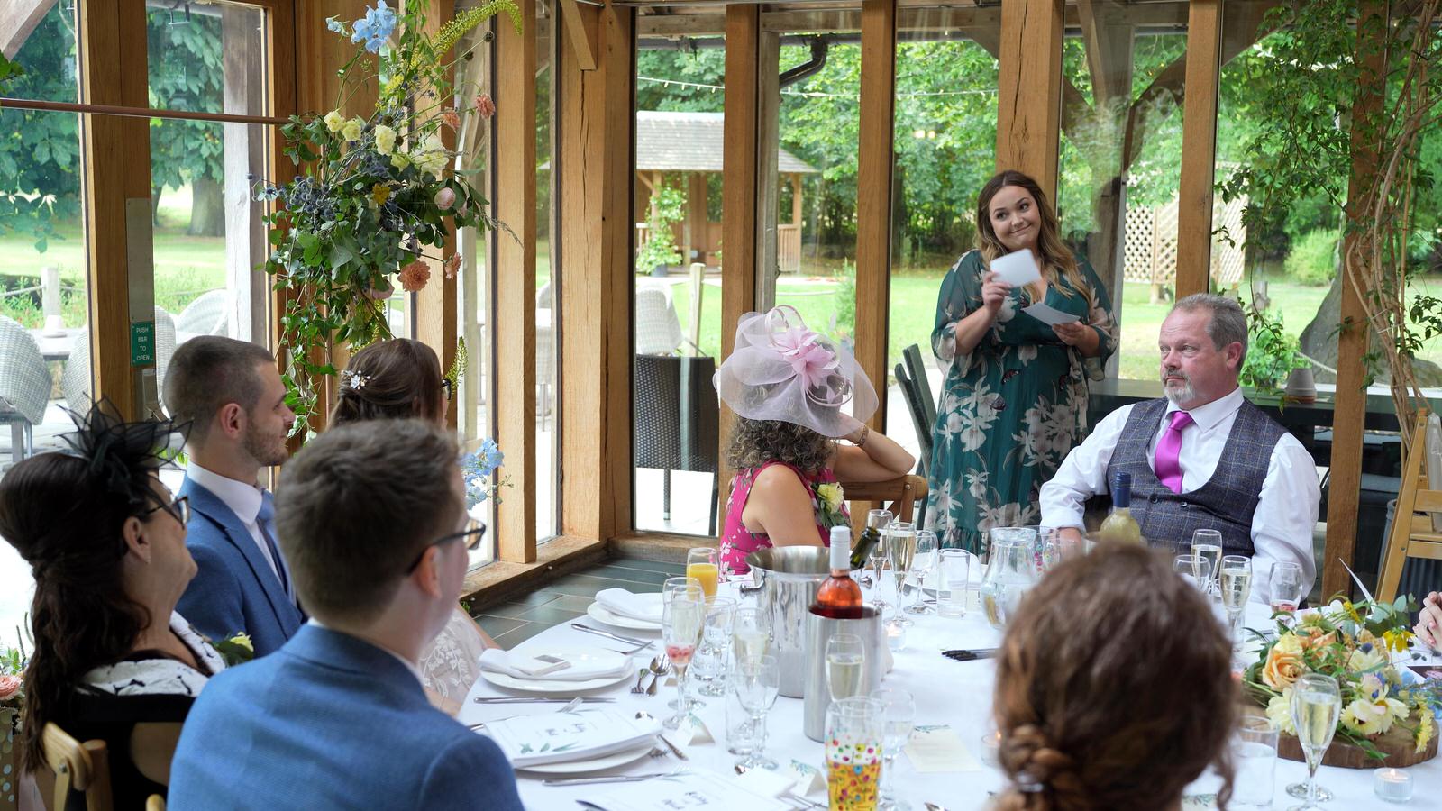 best friend delivers a fun speech during wedding