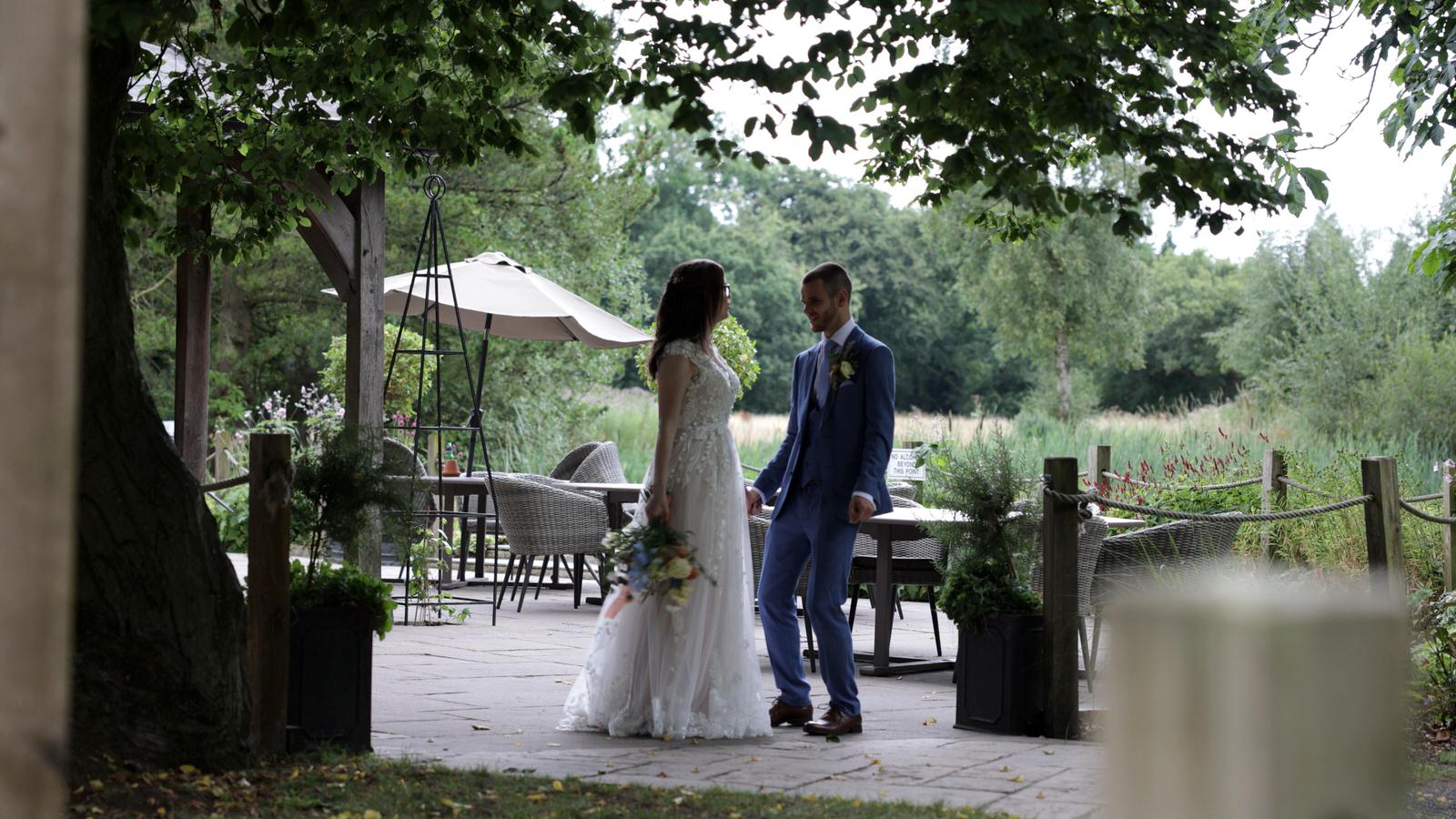 discreet filming of couple dancing under a tree at oaktree of peover
