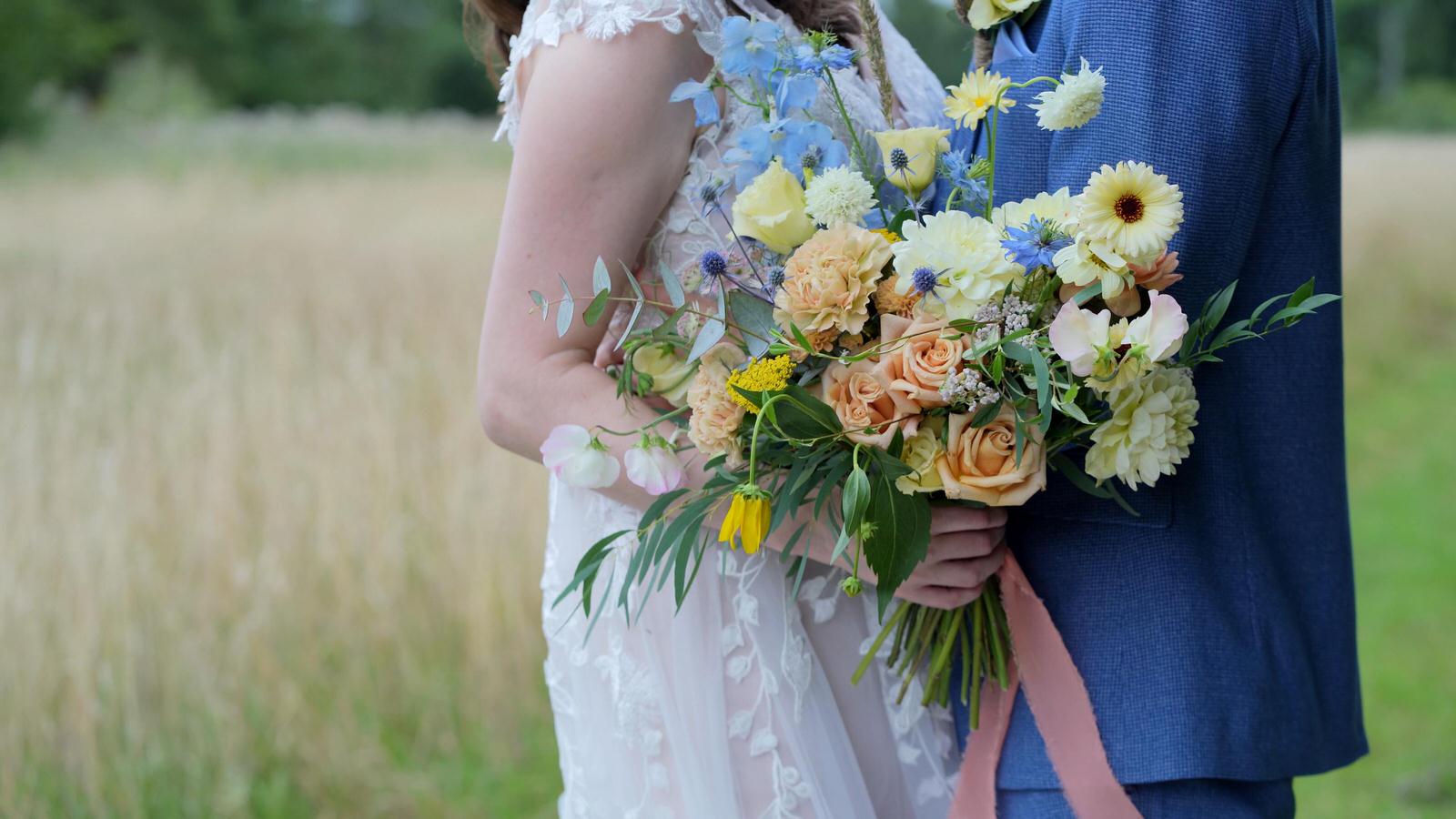 close up of a whimsical hand tied bridal bouquet