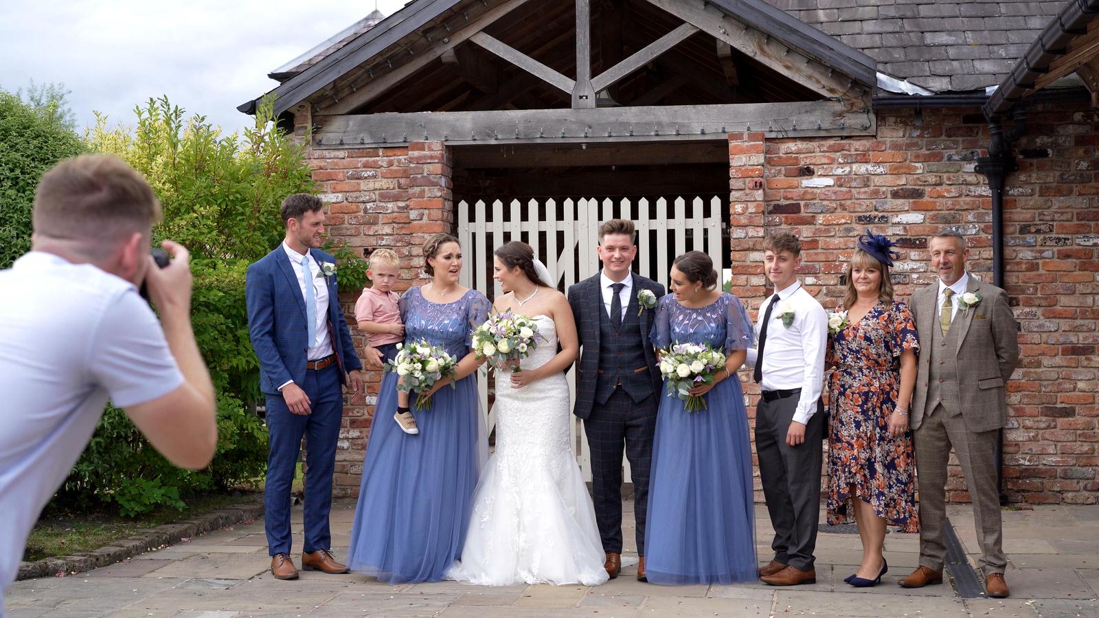 Anthony Ives photographing the family groups outside Charnock Farm