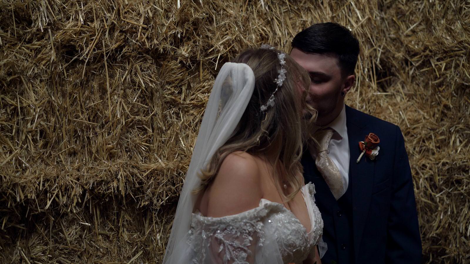 couple smile at each other during photos